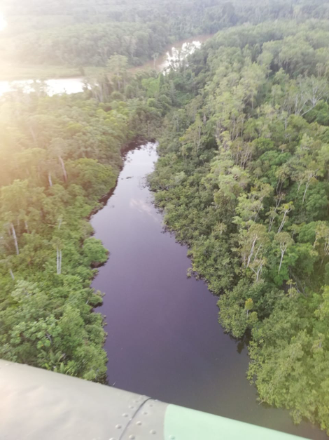 Another aerial view of the spill site, which appears to be entering a river.